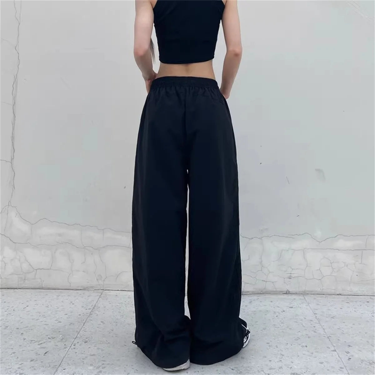 Calça casual de perna larga feminina de carga, Streetwear sólido com cordão,