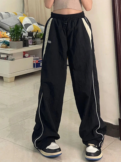 Calça casual de perna larga feminina de carga, Streetwear sólido com cordão,