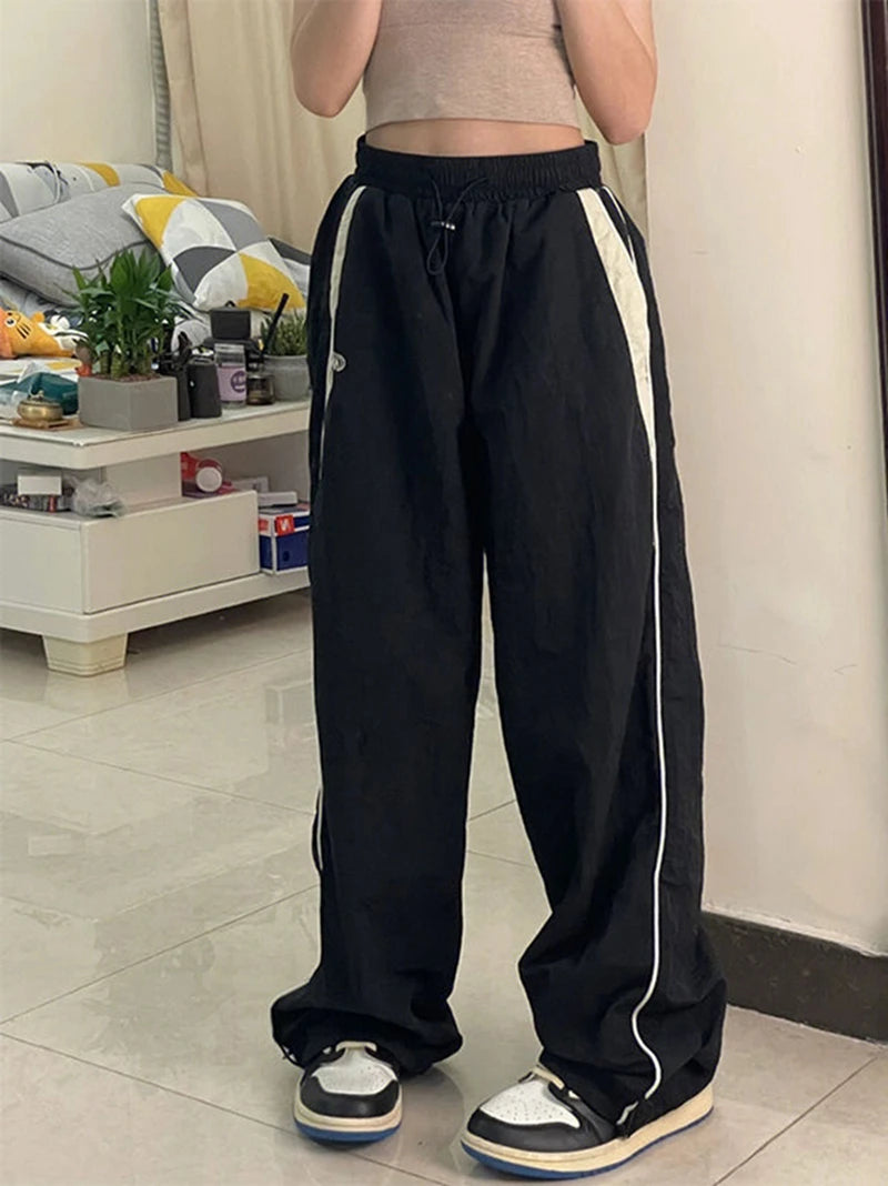 Calça casual de perna larga feminina de carga, Streetwear sólido com cordão,