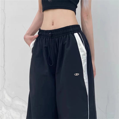 Calça casual de perna larga feminina de carga, Streetwear sólido com cordão,