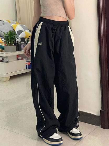 Calça casual de perna larga feminina de carga, Streetwear sólido com cordão,